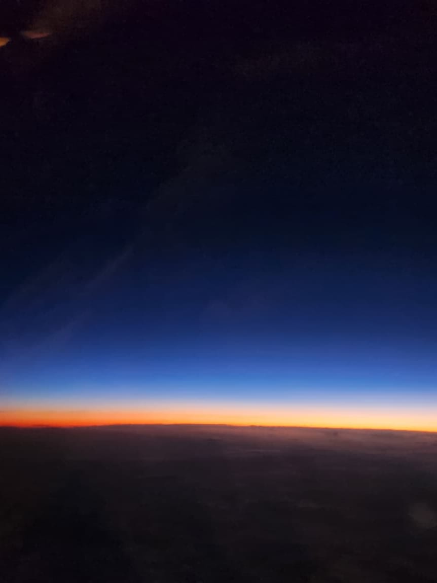 The horizon at first light seen from high above.